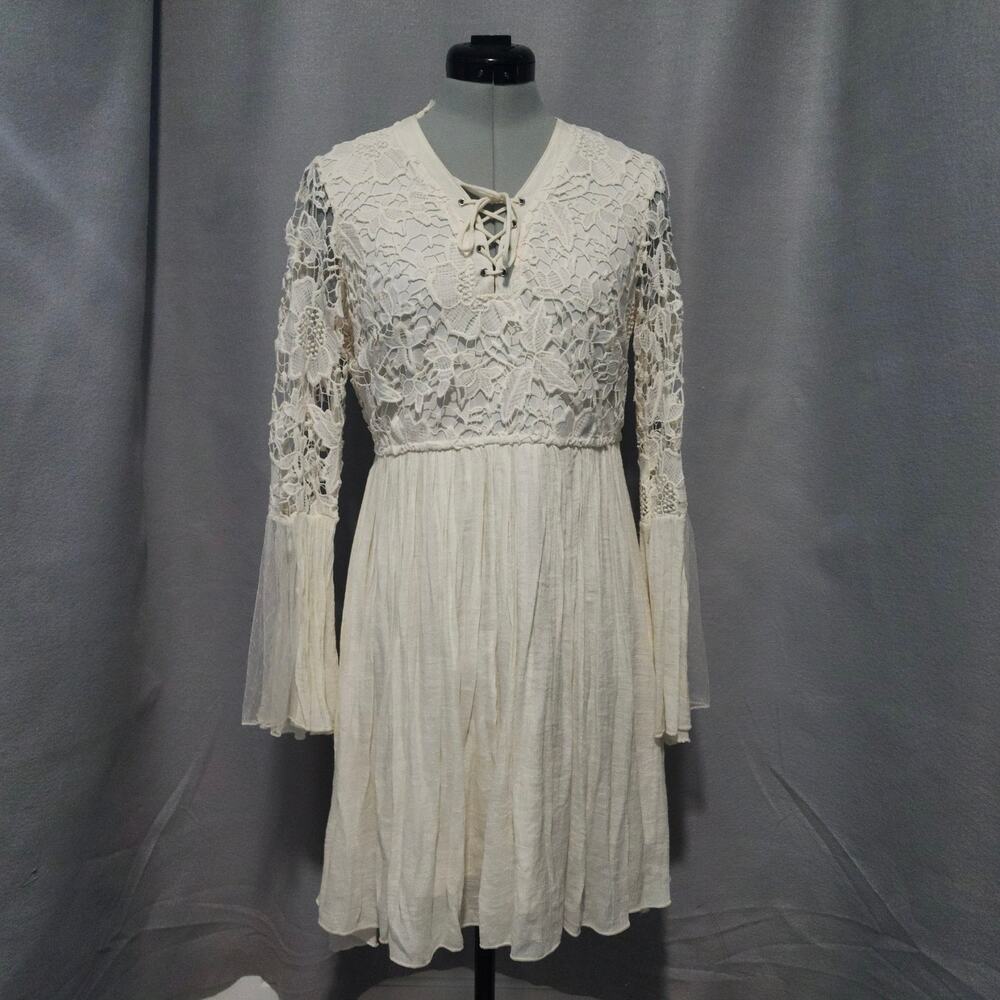 Cream cottagecore, flowy dress, bell sleeves, Gee size medium lace up v-neck